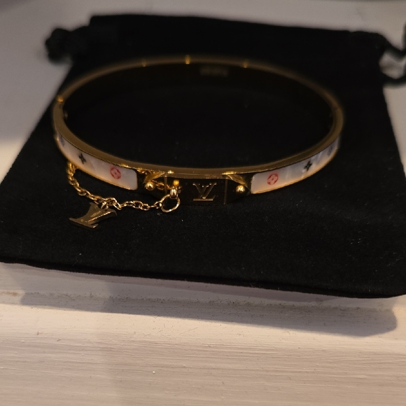 . Jewelry - Elegant Gold and White Bracelet with Charm